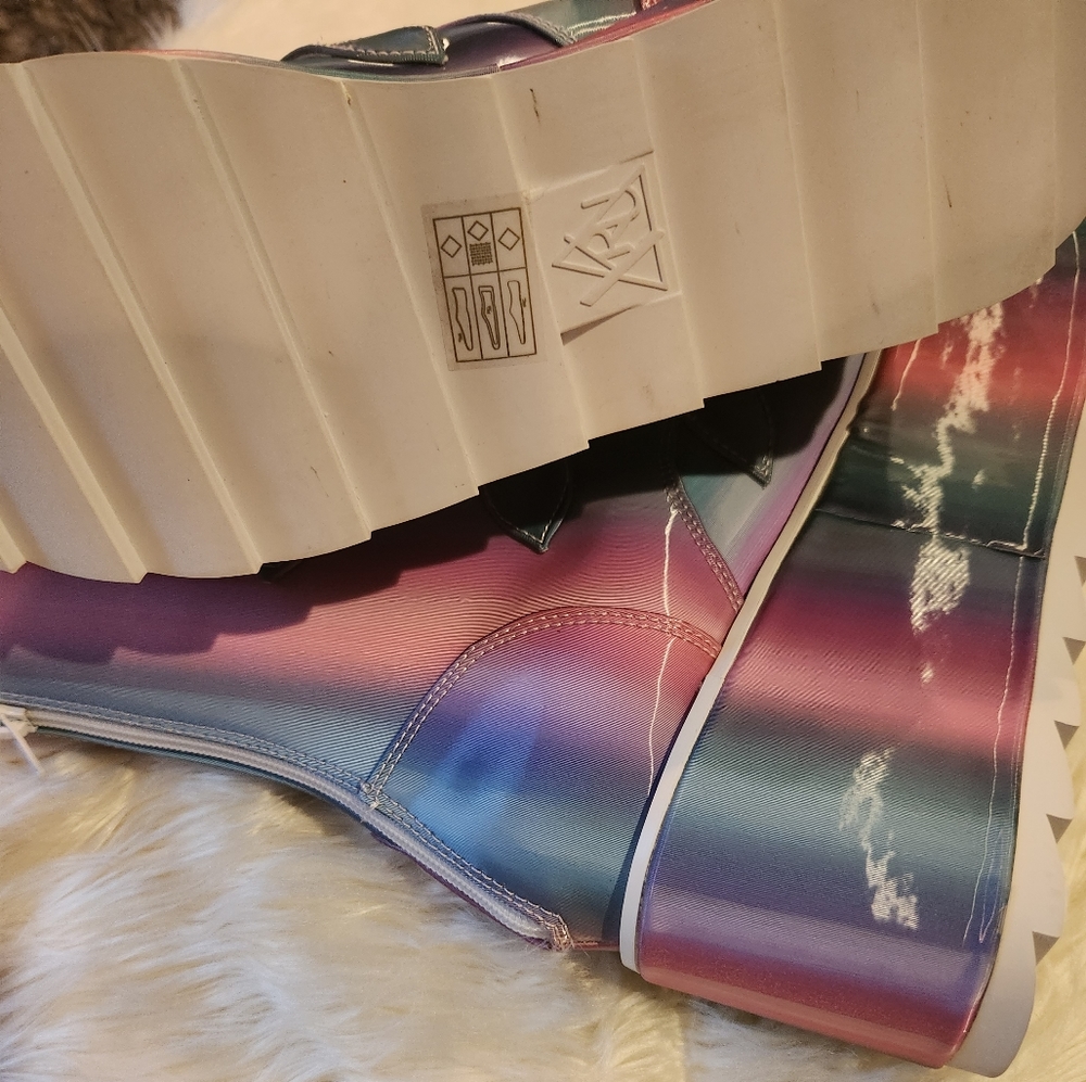 Brand new never worn. Platform boots. Size 9
